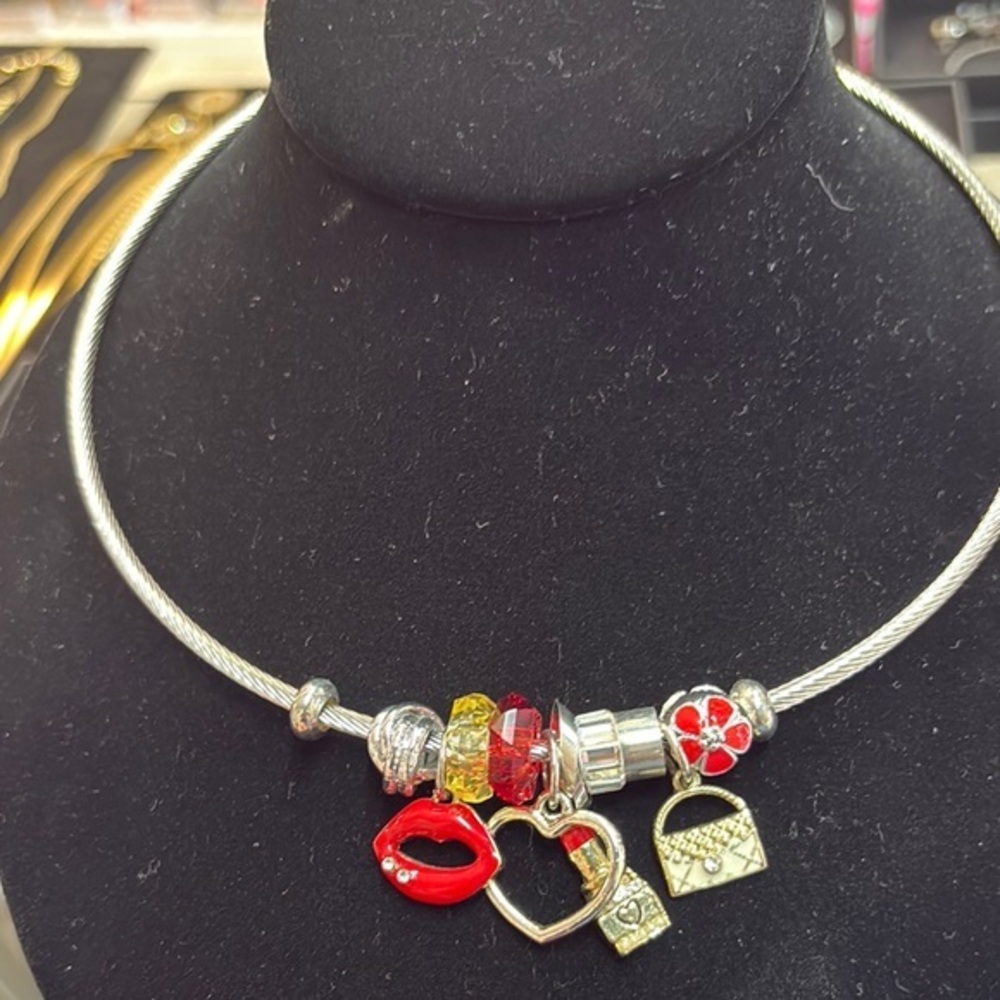 Red and Silver Charm Necklace with Modern Cluster Design